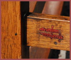 Close-up of the L.&J.G. Stickley clamp mark used circa 1906 to 1912.  "L.&J.G. Stickley, Handcraft"